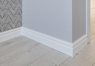 Modern skirting boards installed along a living room wall for a neat finish